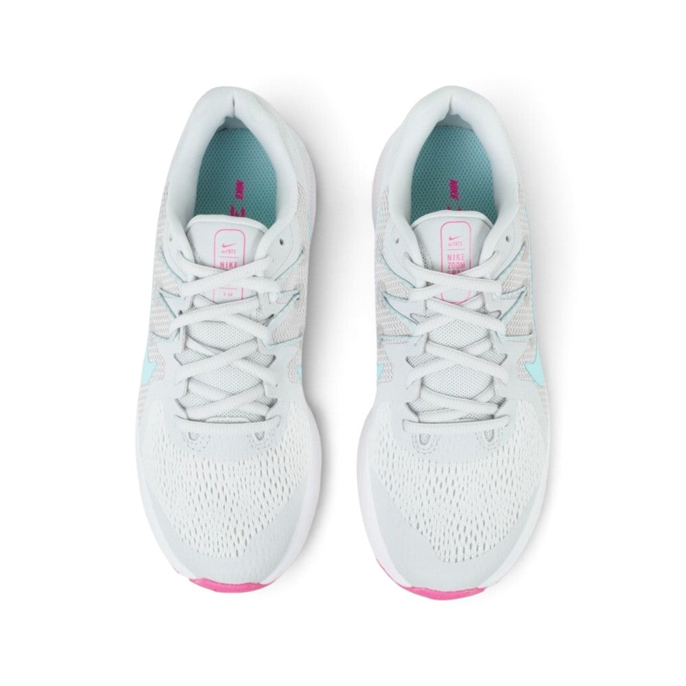 Focuses on the locked-in central lacing layout, displaying the flat grey laces, padded mesh tongues with pink-bordered "NIKE ZOOM SPAN 3" branding badges, light grey collars, and bright Glacier Ice blue insoles printed with pink Nike branding.