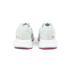 Focuses on the rear profile, highlighting the structured grey synthetic heel counters printed with pink oval "est. 1972 • NIKE RUNNING" logos, breathable collar mesh, and the flared white foam midsole base over the pink rubber outsole.