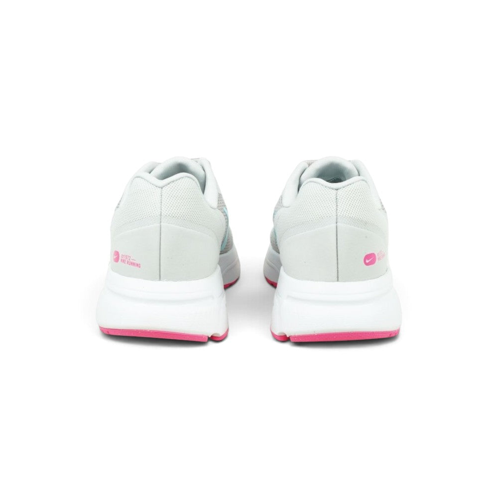 Focuses on the rear profile, highlighting the structured grey synthetic heel counters printed with pink oval "est. 1972 • NIKE RUNNING" logos, breathable collar mesh, and the flared white foam midsole base over the pink rubber outsole.