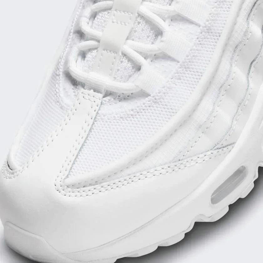 Close-up of Nike Air Max 95 Essential Men's White Trainers CT1268-100 mesh and leather detailing with visible lace system