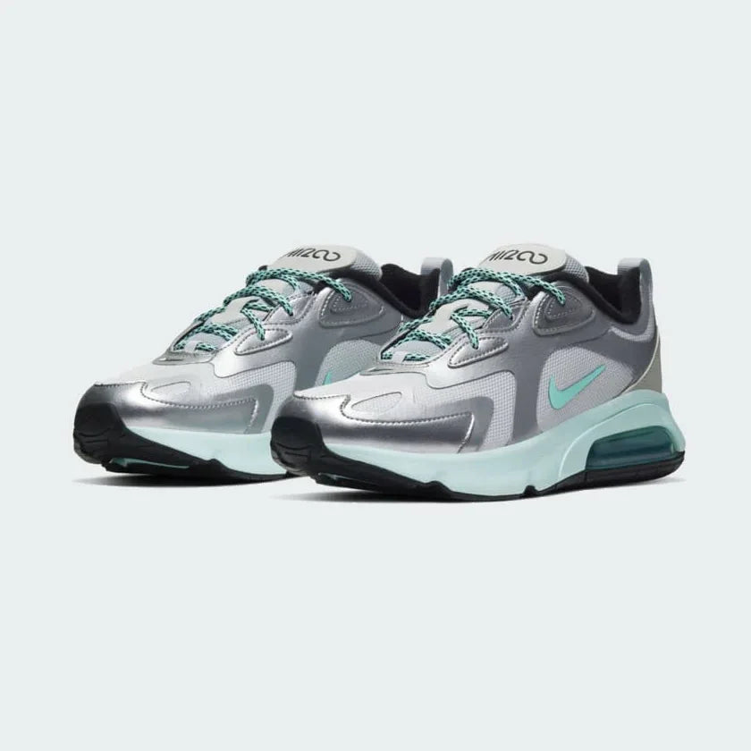 Angled view of two Nike Air Max 200 Women's silver trainers, side by side, showcasing their bold design and visible Air unit.