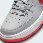 Details the high-definition leather grain and the precision of the crimson accents.