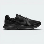 Highlights the high-velocity sweep of the Dark Smoke Grey Nike Swoosh, showing the professional, clean texture of the black mesh upper resting above the sleek, lightweight foam midsole wall.