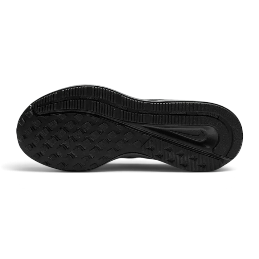 Displays the flat, classic geometric traction pattern of the solid black rubber sole, engineered for unreal everyday road grip and smooth transitions.