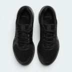Focuses on the locked-in midfoot webbing track, displaying the perfect symmetry of the classic tongue layout and the breathable open mesh guarding the front toe box.