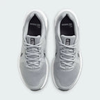 Top-down view of a pair of Nike Run Swift 2 Men's running shoes in particle grey, highlighting their streamlined silhouette and lace-up closure.
