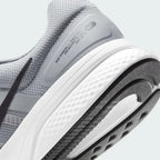 Detailed zoom on the outsole and midsole of the Nike Run Swift 2 Men's particle grey running shoes, highlighting the soft foam cushioning and durable rubber outsole.
