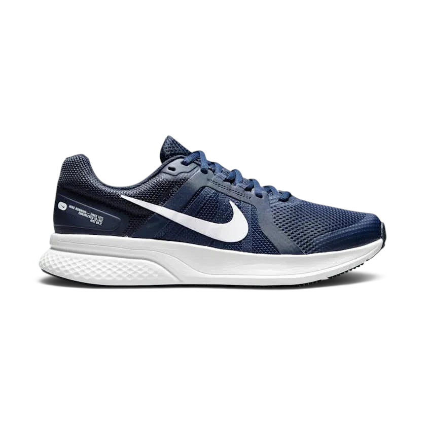 Nike Run Swift 2 Men's running shoes in midnight navy blue with white accents, side profile showing breathable mesh upper, foam midsole, and Nike Swoosh.