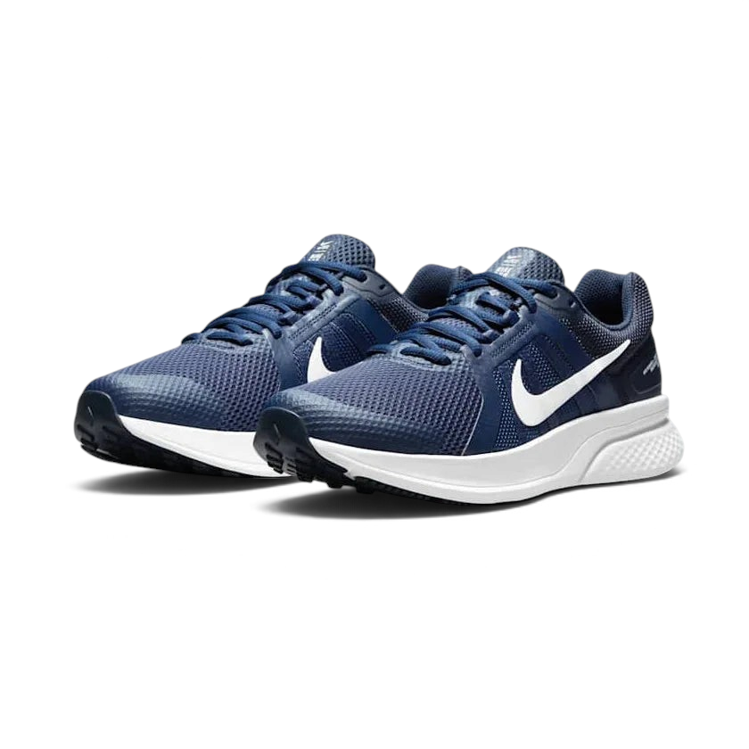 Angled view of two Nike Run Swift 2 Men's navy running shoes, side by side, showcasing their versatile design and cushioned profile.