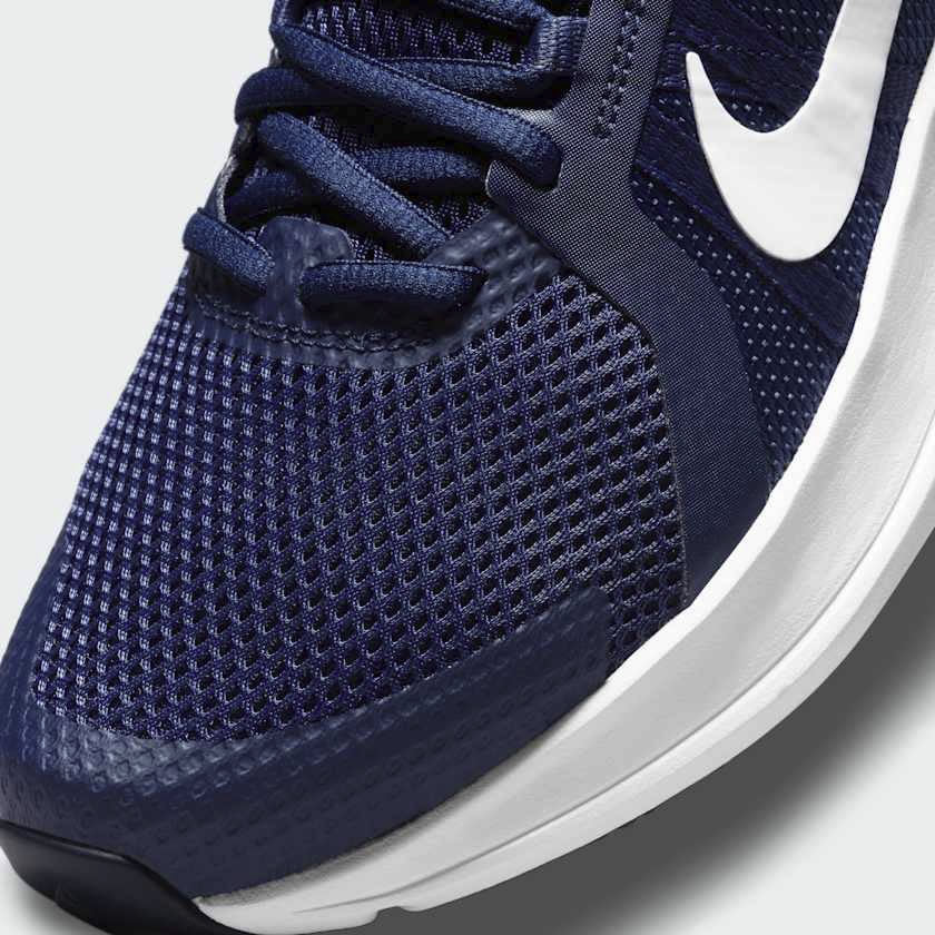 Close-up of Nike Run Swift 2 Men's Blue Running Trainers CU3517-400 laces, mesh texture, and logo