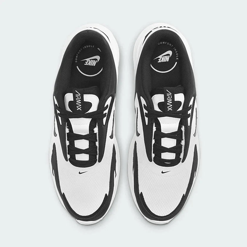 Focuses on the locked-in central lacing layout, displaying the clean symmetry of the white mesh forefoot, black eyestay overlays, black laces, and the padded interior stamped with "COMFORT INSOLE" graphics.