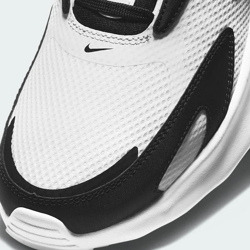 Details the micro-precision of the open-cell forefoot mesh, showing the black toe mudguard wrapping the front cap and the neat tracking of the dark laces.