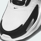 Details the micro-precision of the open-cell forefoot mesh, showing the black toe mudguard wrapping the front cap and the neat tracking of the dark laces.