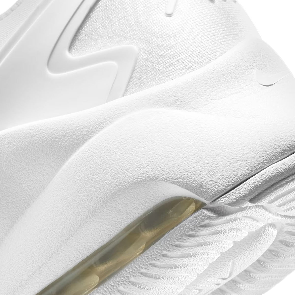 Detailed zoom on the outsole and midsole of the Nike Air Max Bolt Men's white trainers, highlighting the transparent Max Air cushioning and foam midsole.