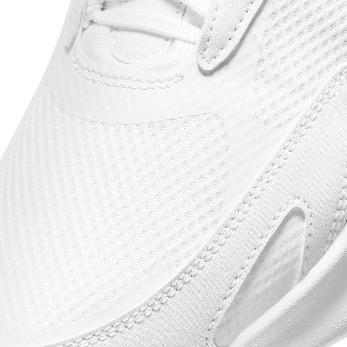 Close-up zoom on the front of the Nike Air Max Bolt Men's white trainers, showing the mesh toe box, lacing system, and synthetic overlays.