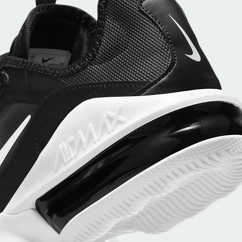 Detailed zoom on the outsole and midsole of the Nike Air Max Infinity 2 Men's trainers, highlighting the plush foam cushioning, large flex grooves, and durable rubber outsole.