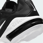 Detailed zoom on the outsole and midsole of the Nike Air Max Infinity 2 Men's trainers, highlighting the plush foam cushioning, large flex grooves, and durable rubber outsole.