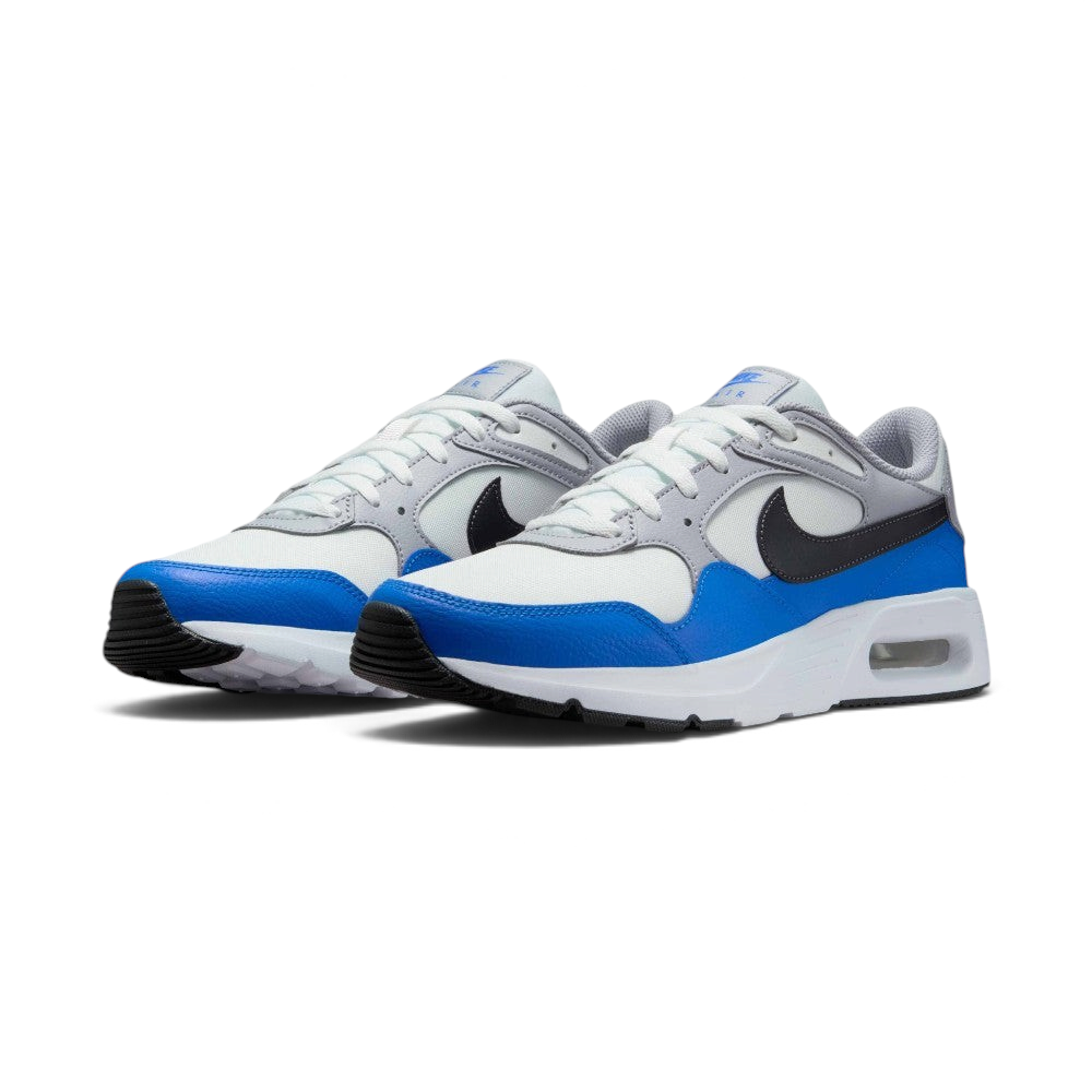 Emphasising the low-cut, athletic stance of the trainers and the harmonious contrast between the Summit White bases, Wolf Grey trim, and vivid Light Photo Blue mudguards.