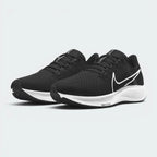 Emphasising the athletic, aerodynamic running stance and the professional distribution of the monochrome panels.
