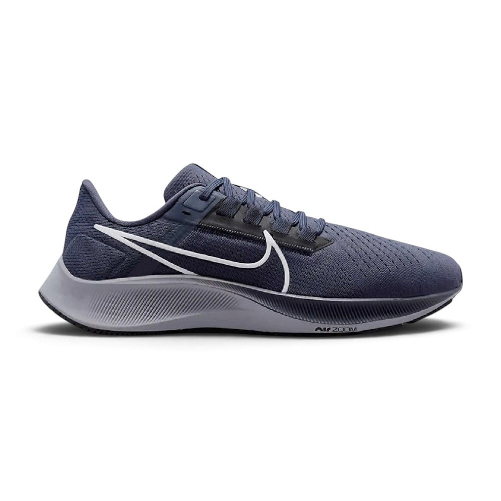 Highlights the high-velocity sweep of the Wolf Grey Nike Swoosh, showing the crisp, dual-tone texture of the Thunder Blue mesh upper resting above the textured black React foam midsole wall. Main image
