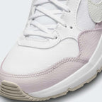 Close-up of Nike Air Max SC Juniors White Trainers CZ5358-115 mesh upper, tongue logo, and eyelet detail