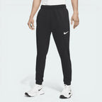 Overhead view of the fitness trousers laid flat, highlighting the elastic waistband and the quality of the French terry fleece.