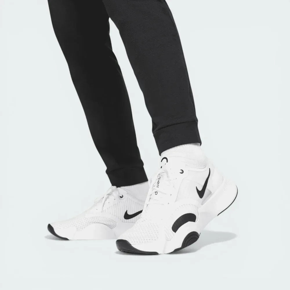 Detailed zoom on the tapered ankle cuffs, highlighting the durable stitching and the stretch-fit material.