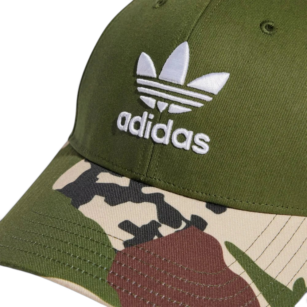 Emphasising the clean visual placement of the embroidered Trefoil logo standing proud against the pine fabric backdrop.