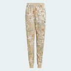 Top-down view of the joggers laid flat, showcasing the elasticated drawcord waist and the intricate multicolor camo pattern.