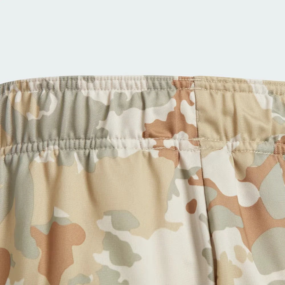 Waistband of the interior tricot lining, detailing the soft-touch recycled material and the official Adidas branding.