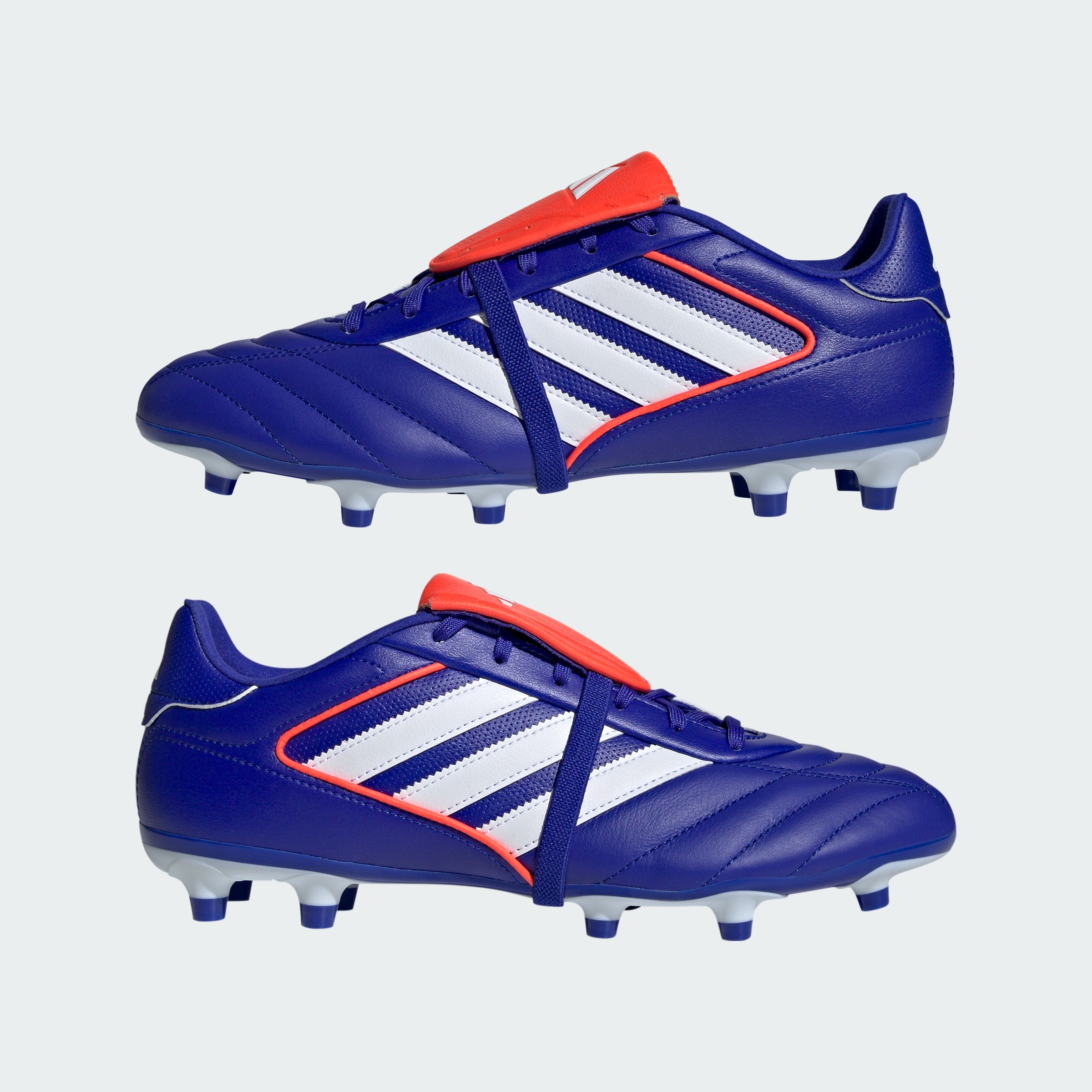Angle View Showing Both Pair Side by Side: Emphasising the classic T-toe construction and the high-contrast Lucid Blue and Solar Red colour blocking.