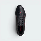 Focuses on the "locked-in" lace closure and the professional finish of the perforated tongue.