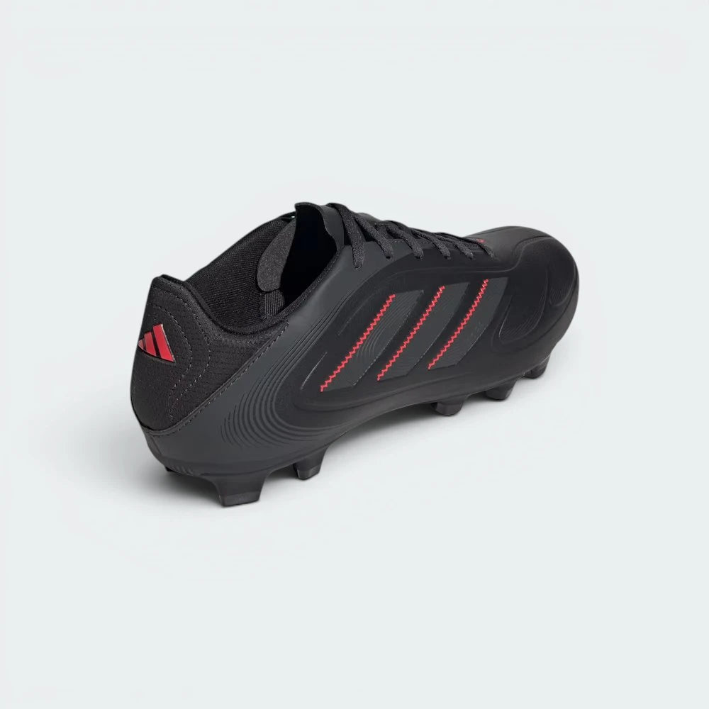 Focuses on the sleek heel construction and the professional finish of the synthetic leather.