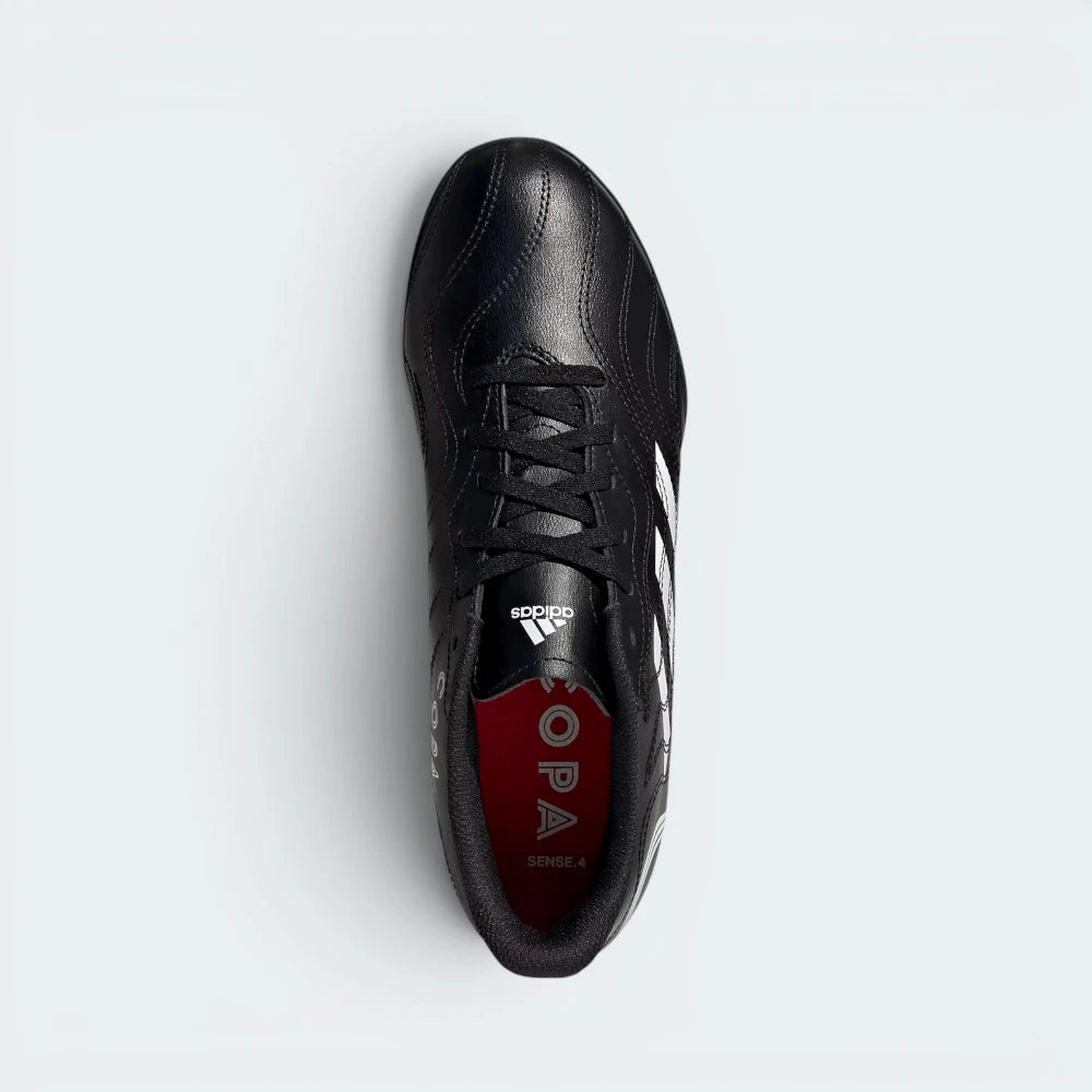 Focuses on the locked-in lacing system and the professional adidas branding on the tongue.