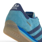 Zoom Looking at the Front of the Shoes and Laces: Macro focus on the toe cap overlay, tonal blue eyelets, and flat matching laces.   
