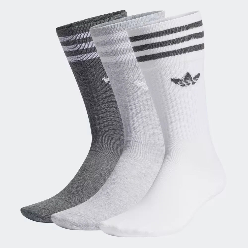 Looking down at the three colourways (White, Light Grey, Dark Grey) laid out side-by-side to showcase the tonal variety.