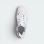 Focuses on the locked-in lace closure, the high-definition mesh insert on the upper foot, and the sleek internal bootie opening.