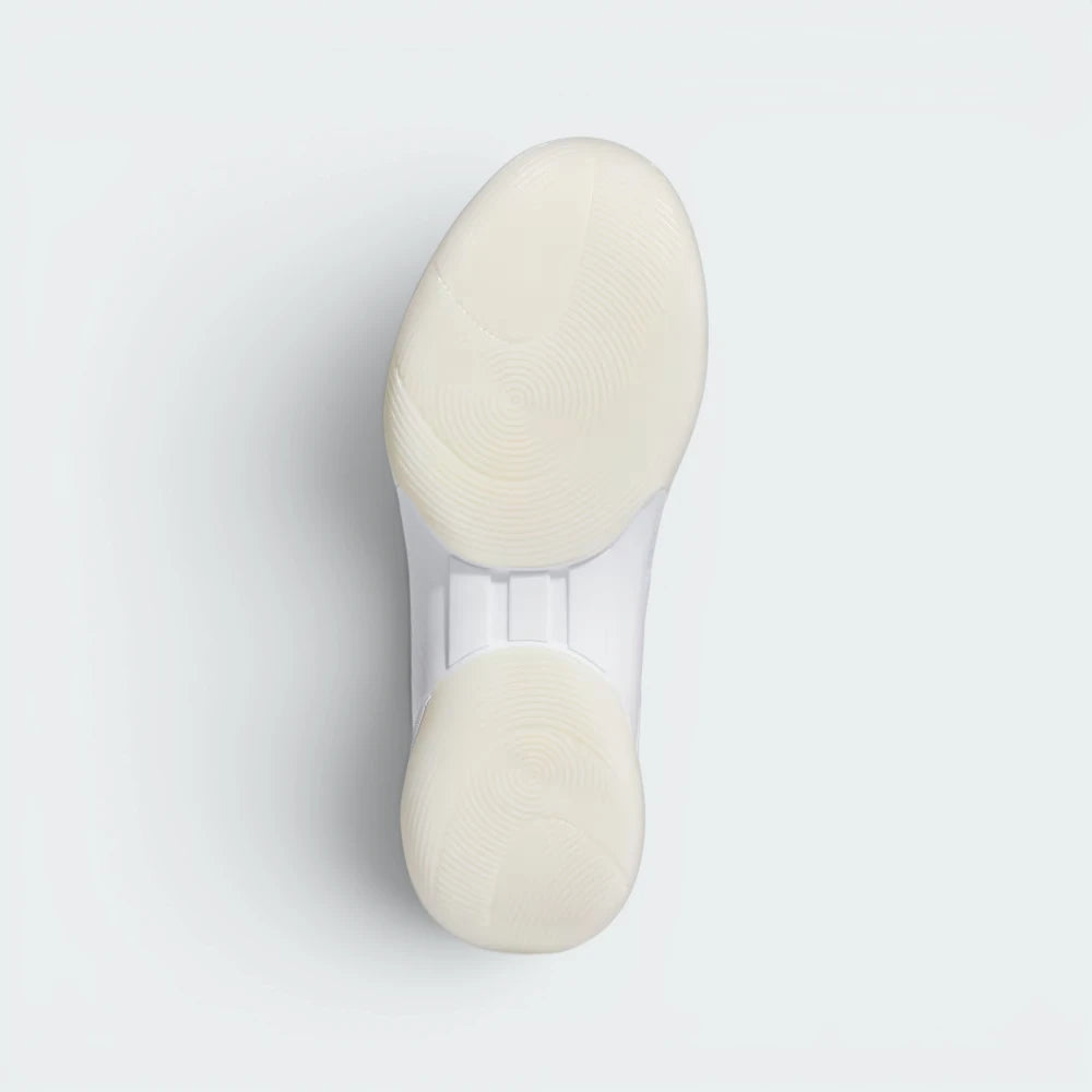 Displays the unique rubber outsole layout and its technical, elevated traction pattern designed for unreal court grip.