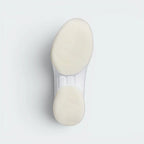 Displays the unique rubber outsole layout and its technical, elevated traction pattern designed for unreal court grip.
