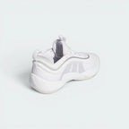 Focuses on the structural integration of the TPU heel clip and the clean finish of the signature Spida detailing.