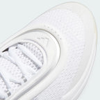Details the high-definition textile weave on the toe box and the reflective properties embedded near the throat.