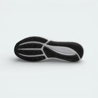 View of the black rubber outsole, showcasing the signature molded star traction pattern and flexible grooves.