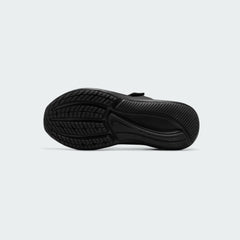 View of the outsole of the Nike Star Runner 3 Children's black shoes, showing the durable rubber sole with a star-inspired tread pattern and flex grooves.