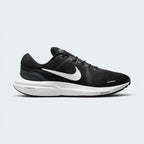 Highlights the high-velocity sweep of the white Nike Swoosh, showing the crisp texture of the black engineered mesh upper resting above the thick ZoomX cushioning foam stack.