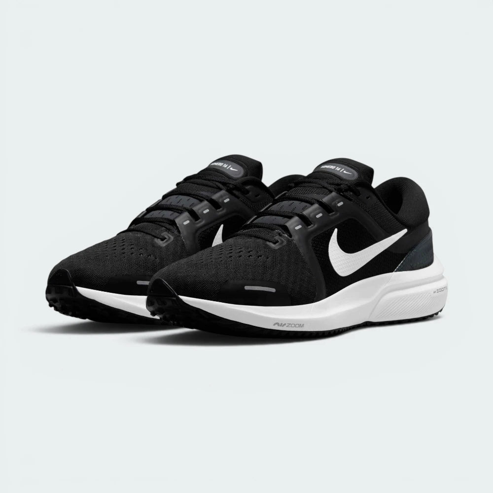 Emphasising the athletic, performance running silhouette and the professional, minimalist distribution of the clean monochrome tones.
