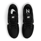 Focuses on the locked-in central lacing layout, displaying flat black laces, padded mesh tongues with white "Nike Zoom Structure 24" branding patches, and cushioned black insoles printed with large white Nike logos.