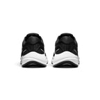 Focuses on the rear profile, displaying the moulded black heel counter, dual horizontal reflective safety strips, and the wide flared base of the white crash-pad foam midsole.