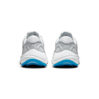 Focuses on the rear profile, displaying the structured grey moulded heel counter, reflective safety tab, and the wide flared footprint of the crash-pad midsole base.