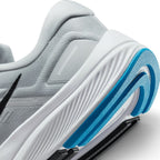 Highlights the "unreal" clean finish where the sculpted white foam midsole meets the lateral rubber crash rail and responsive forefoot Zoom Air boundary.