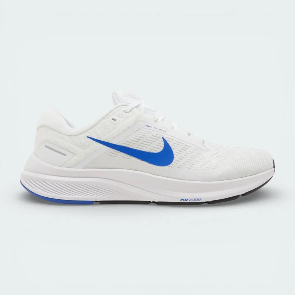 Side profile of the Nike Air Zoom Structure 24 in white, showing the bold Hyper Royal Swoosh, ventilated mesh upper, and the supportive foam midsole.